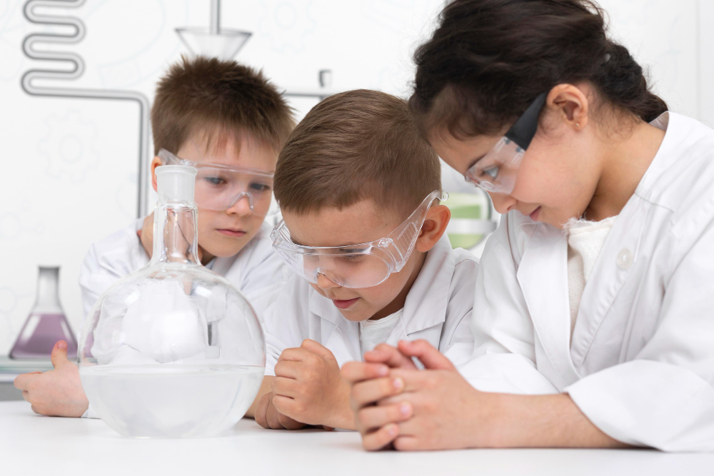 students-doing-chemical-experiment-school